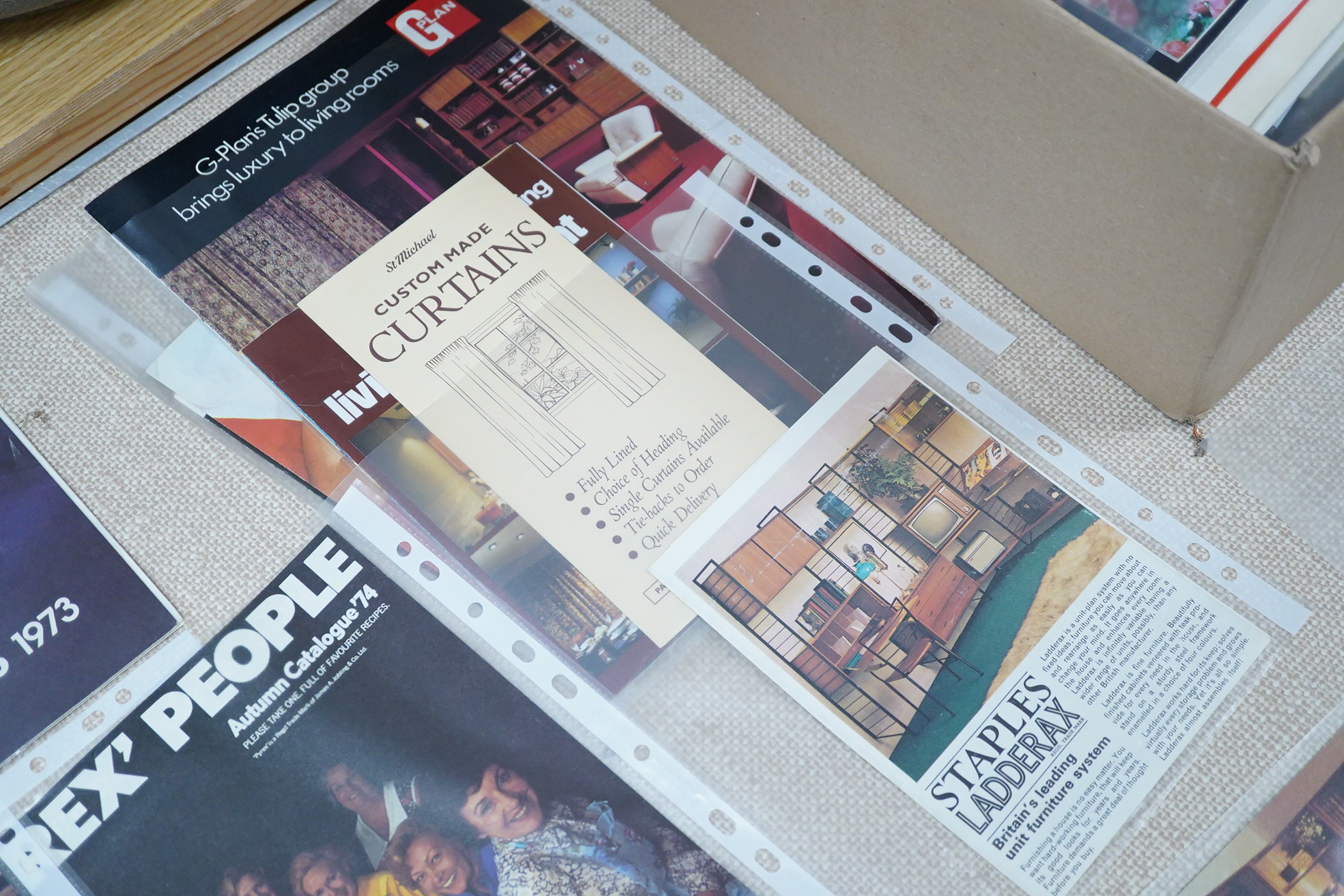 A collection of 1970s advertising booklets for G Plan, Ladderax, Qualcast, Pyrex, etc.